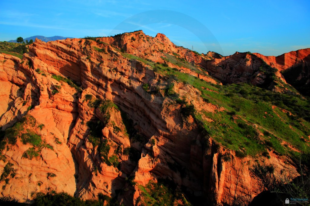 View of canyon with rocks giving off a red color