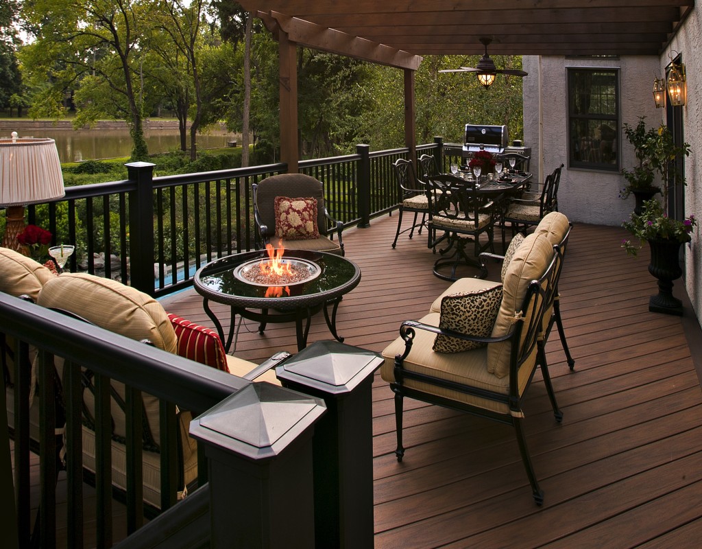 Staging backyard with furniture and fireplace