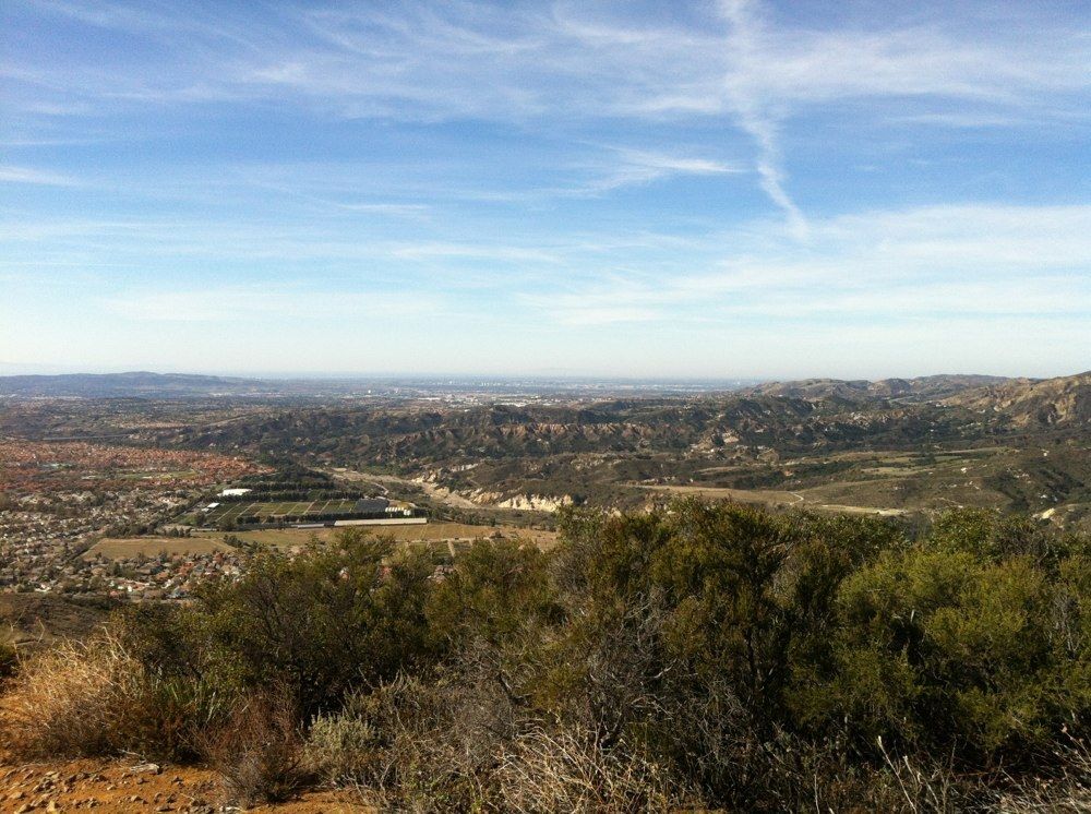 Hiking trail with blue sky and scattered clouds